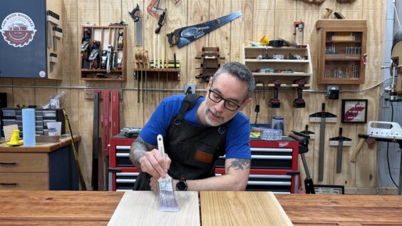 Applying finish to two boards